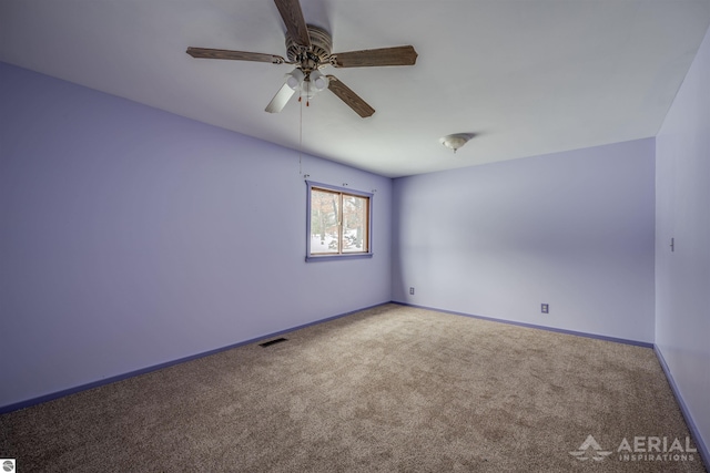 unfurnished room with carpet floors and ceiling fan