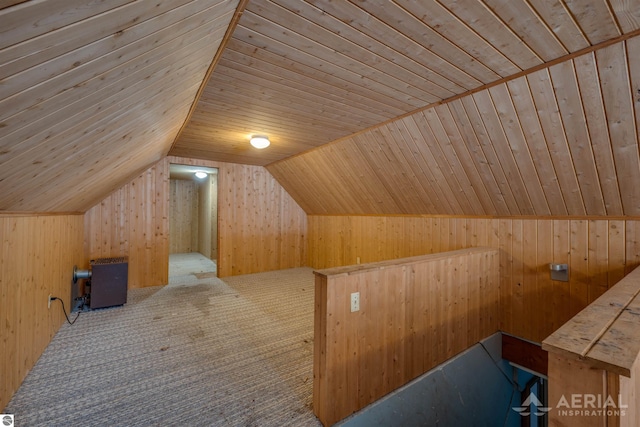 bonus room featuring carpet flooring, wood walls, vaulted ceiling, and wooden ceiling