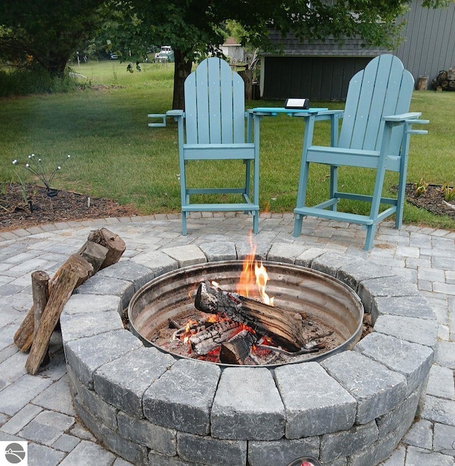 view of patio featuring a fire pit