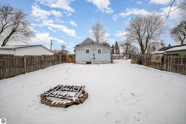 view of snow covered house