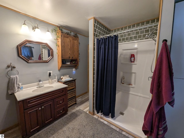 bathroom with vanity and a shower with shower curtain