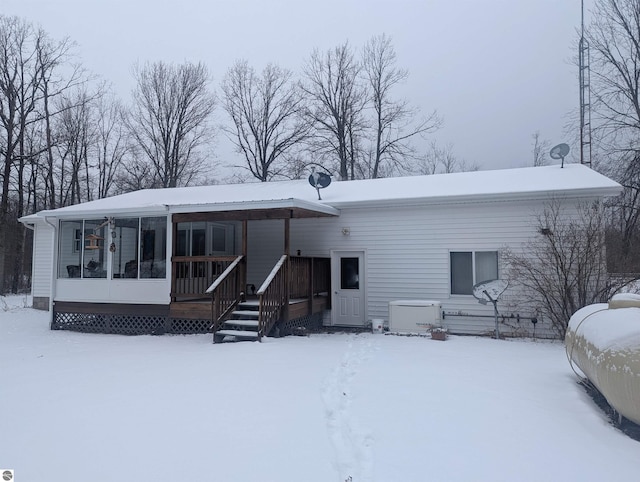view of snow covered property