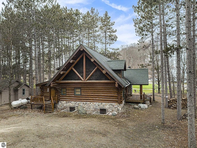 view of front of property featuring a deck