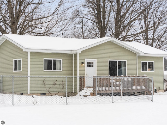 single story home featuring a deck