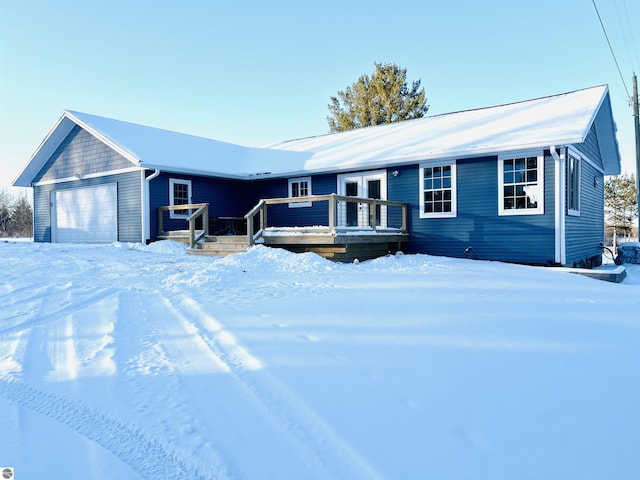 ranch-style home with a garage