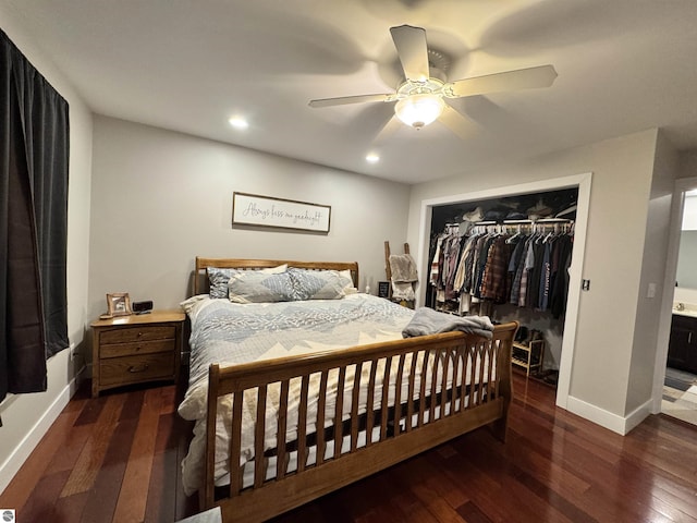 bedroom featuring ceiling fan, a closet, and dark hardwood / wood-style flooring