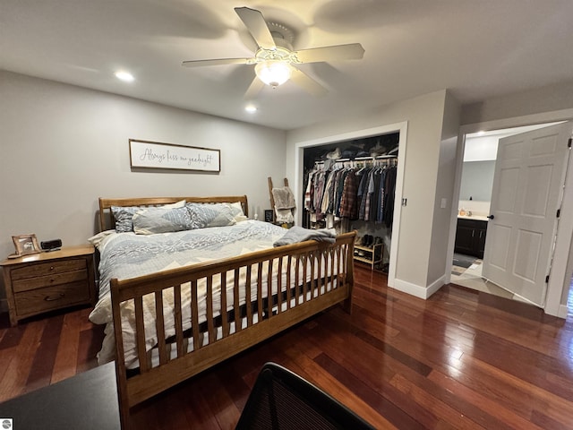 bedroom featuring ceiling fan, a closet, dark hardwood / wood-style flooring, and connected bathroom