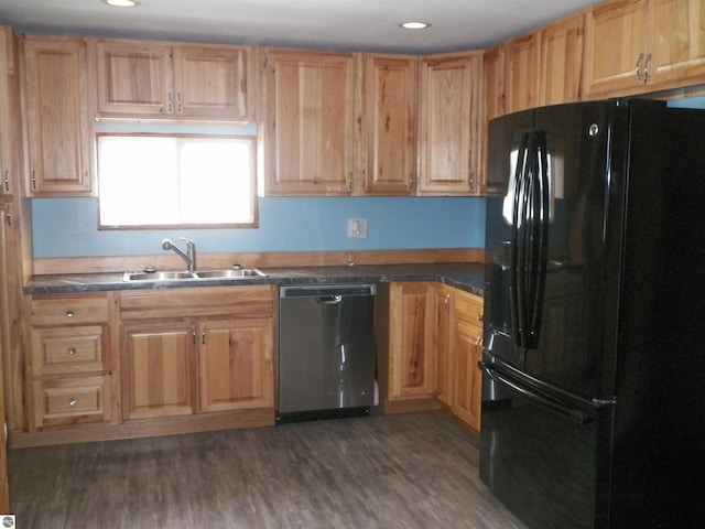 kitchen with black refrigerator with ice dispenser, sink, stainless steel dishwasher, and dark wood-type flooring