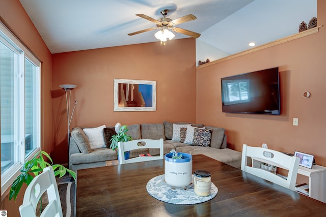 living room with lofted ceiling and ceiling fan