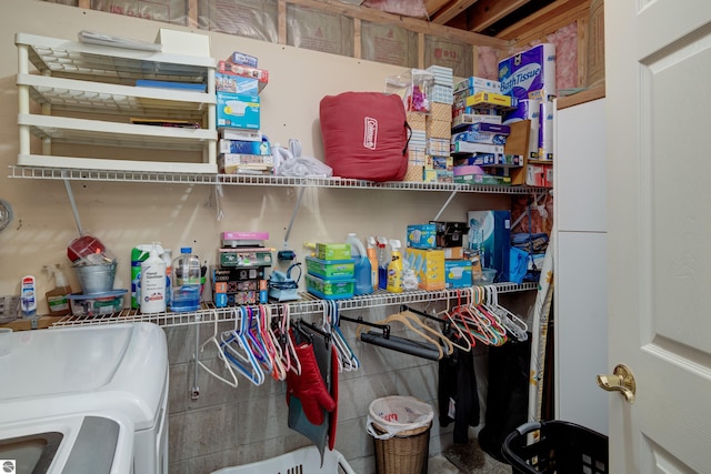 pantry featuring washer and dryer