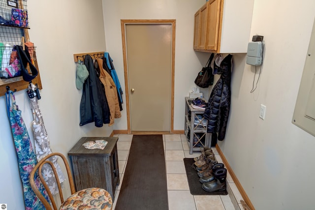 mudroom with light tile patterned floors