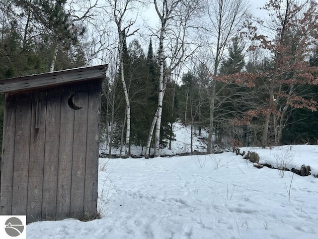 view of yard covered in snow