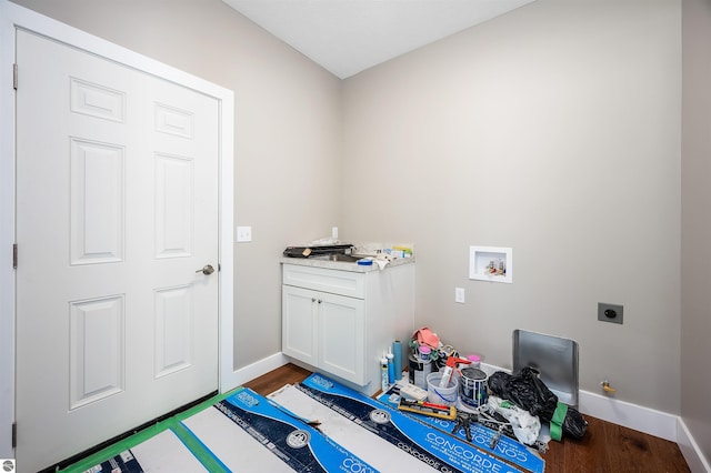 laundry area with hookup for a washing machine, electric dryer hookup, and hardwood / wood-style floors