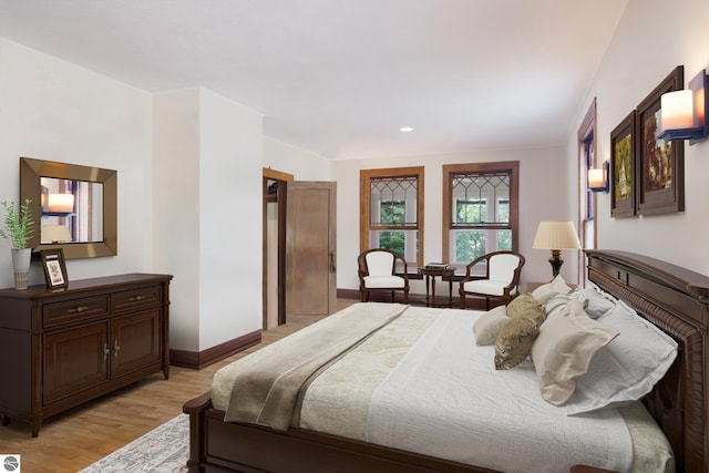 bedroom with light wood-type flooring