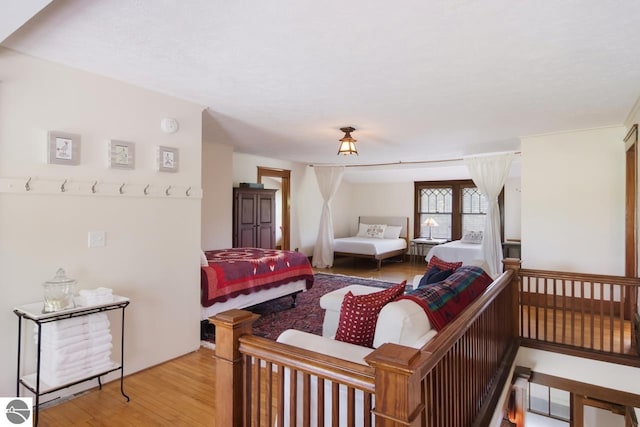 bedroom featuring light wood-type flooring