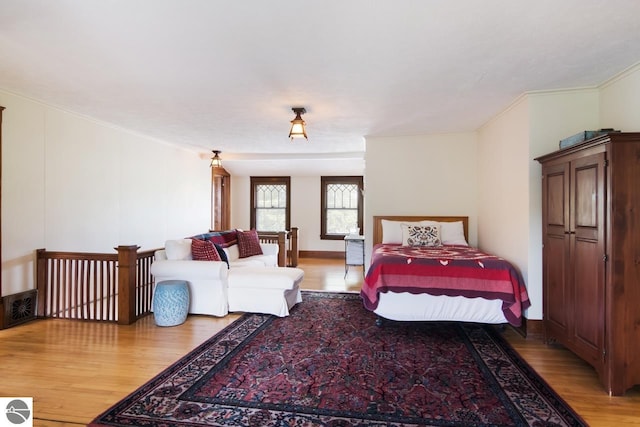 bedroom featuring light hardwood / wood-style flooring