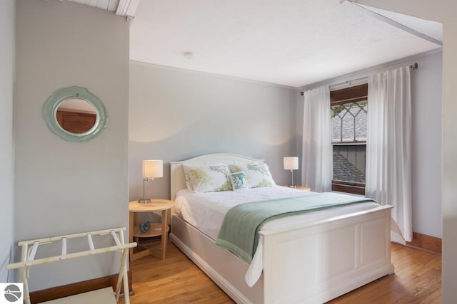 bedroom featuring light hardwood / wood-style flooring