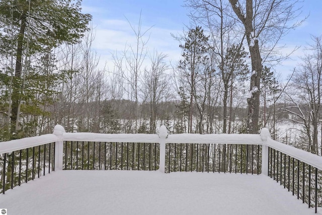 view of snow covered deck