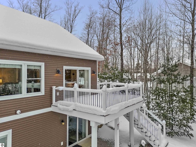 view of snow covered deck