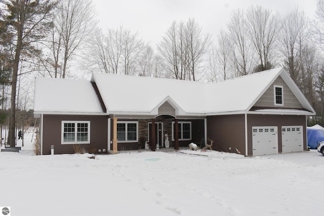 view of front of property featuring a garage