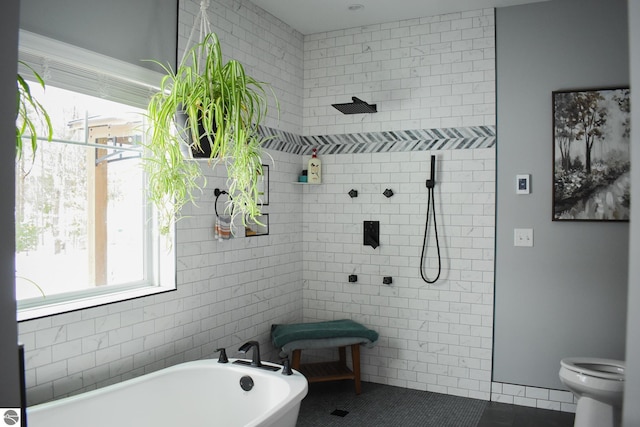 bathroom featuring plus walk in shower, toilet, tile patterned flooring, and tile walls