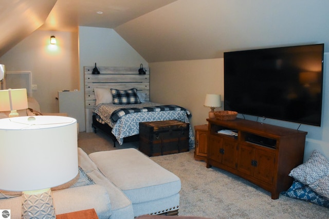 carpeted bedroom featuring vaulted ceiling