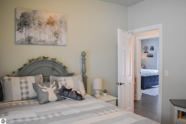 bedroom featuring hardwood / wood-style floors