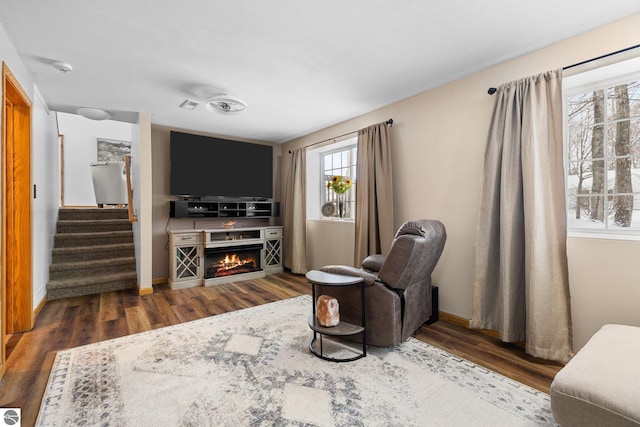 sitting room featuring dark hardwood / wood-style flooring