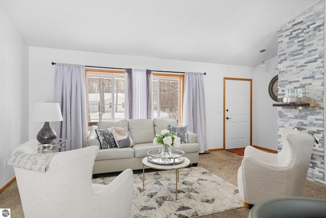 living room featuring carpet floors and vaulted ceiling