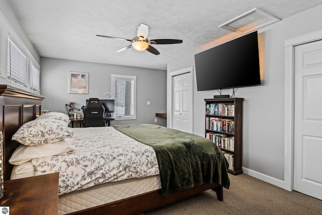 carpeted bedroom with ceiling fan