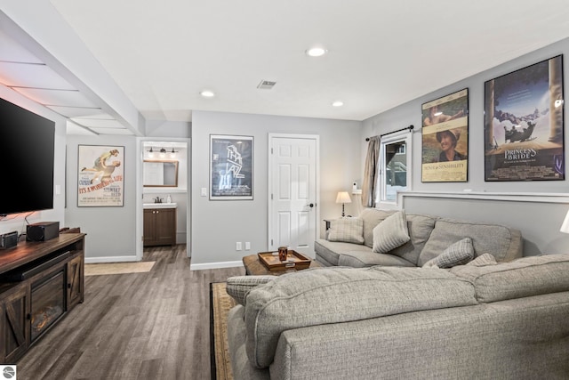 living room featuring dark hardwood / wood-style flooring