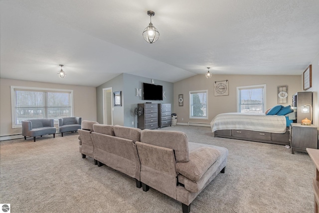 carpeted bedroom with baseboard heating, a textured ceiling, and lofted ceiling