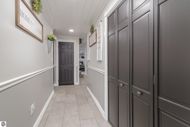 entryway with light tile patterned floors