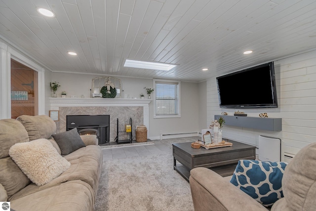 tiled living room featuring wooden ceiling, ornamental molding, a fireplace, and a baseboard radiator