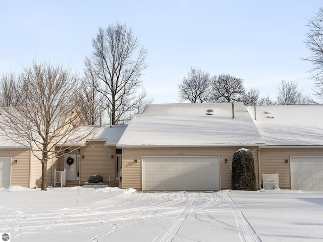 single story home with a garage