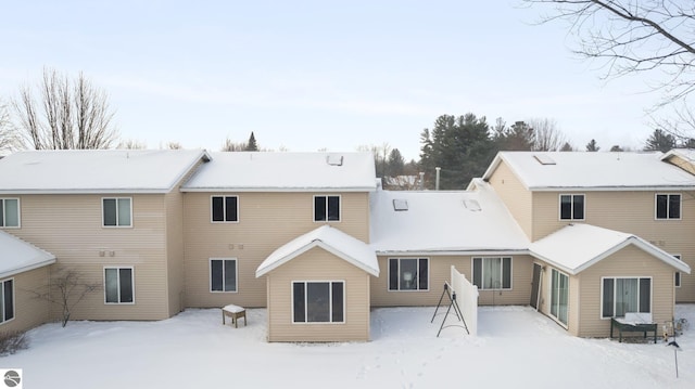 view of snow covered property