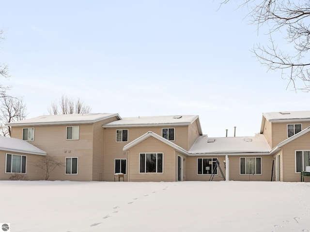 view of snow covered property