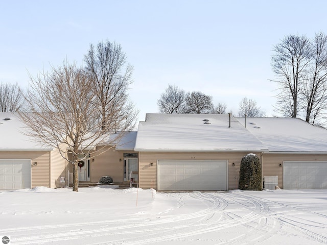 ranch-style home with a garage