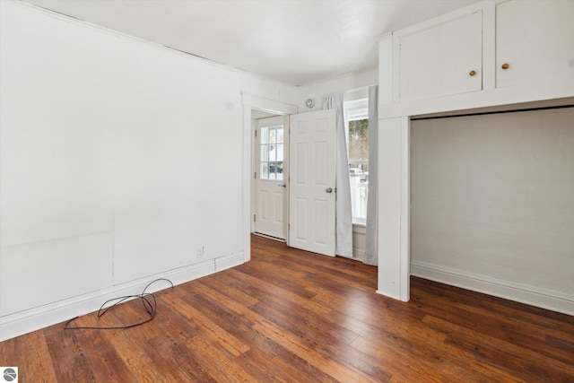 interior space featuring dark wood-type flooring