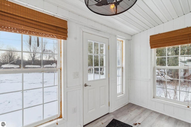 doorway with light hardwood / wood-style floors