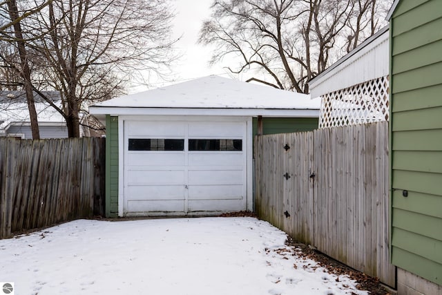 view of snow covered garage