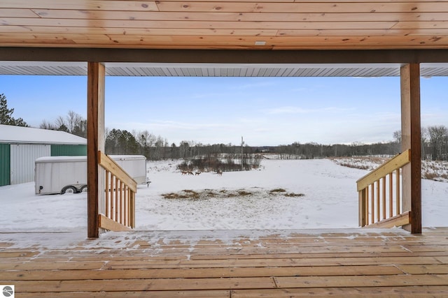 view of snow covered deck