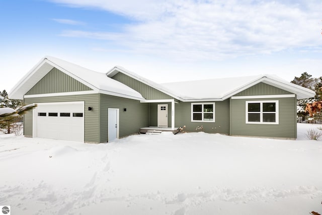 single story home featuring a garage