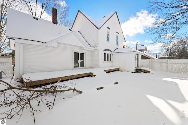 view of snow covered property