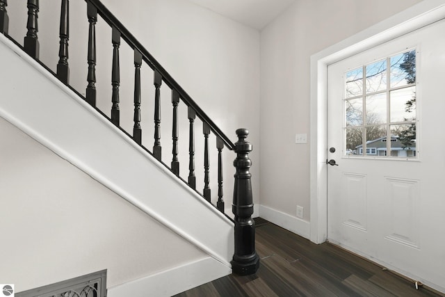 entrance foyer with dark hardwood / wood-style flooring