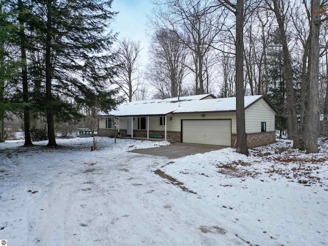 view of front facade with a porch and a garage