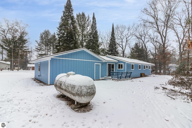 view of snow covered house