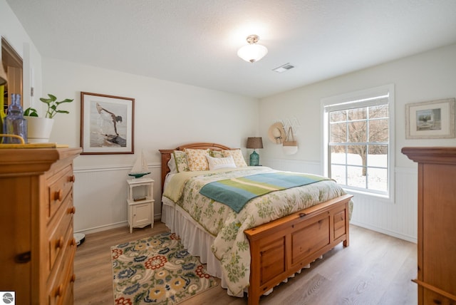 bedroom featuring light hardwood / wood-style flooring