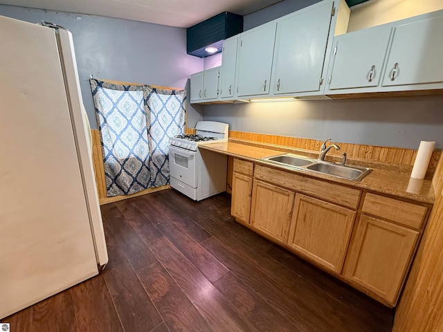 kitchen with sink, white appliances, and dark wood-type flooring