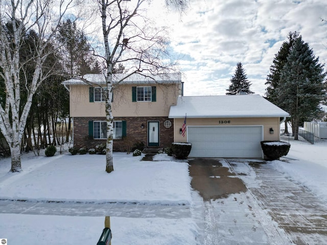 view of front of home with a garage